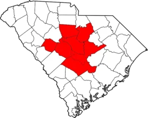 A map of South Carolina with highlighted red areas indicating specific midlands regions.
