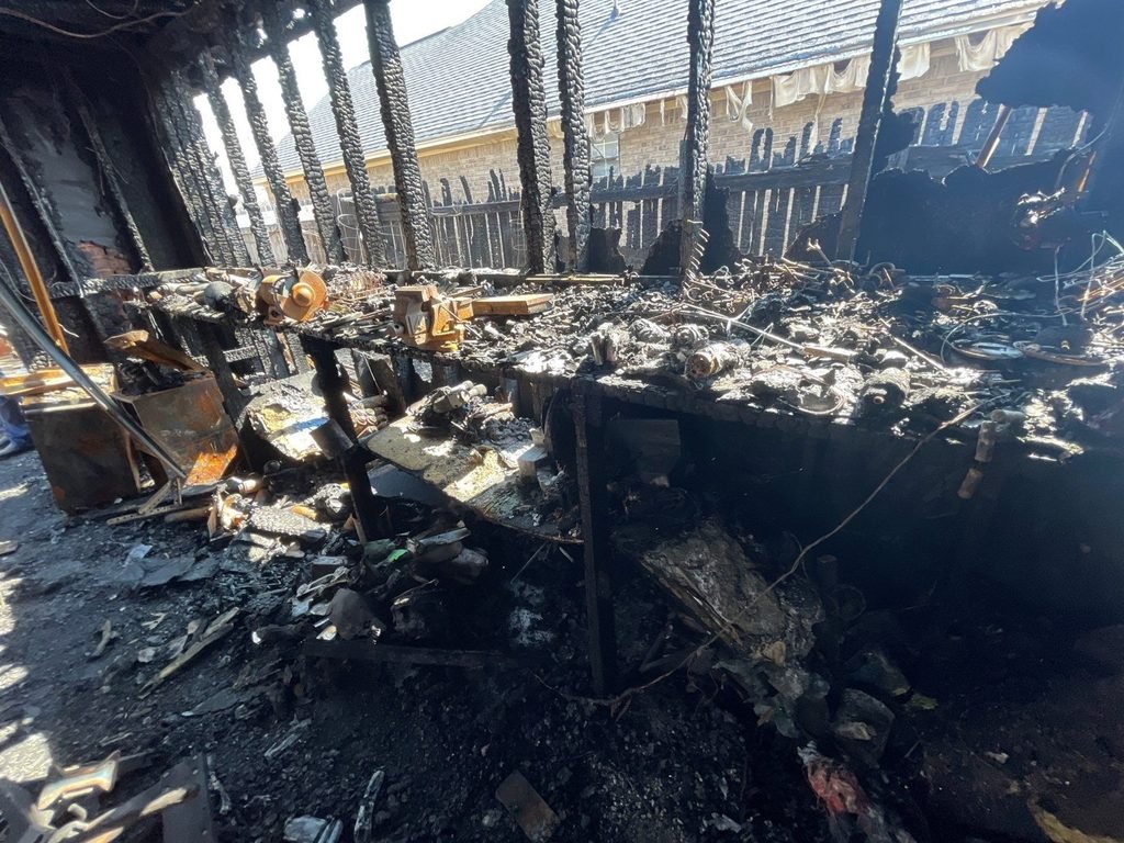 Burned contents inside the shed after the fire